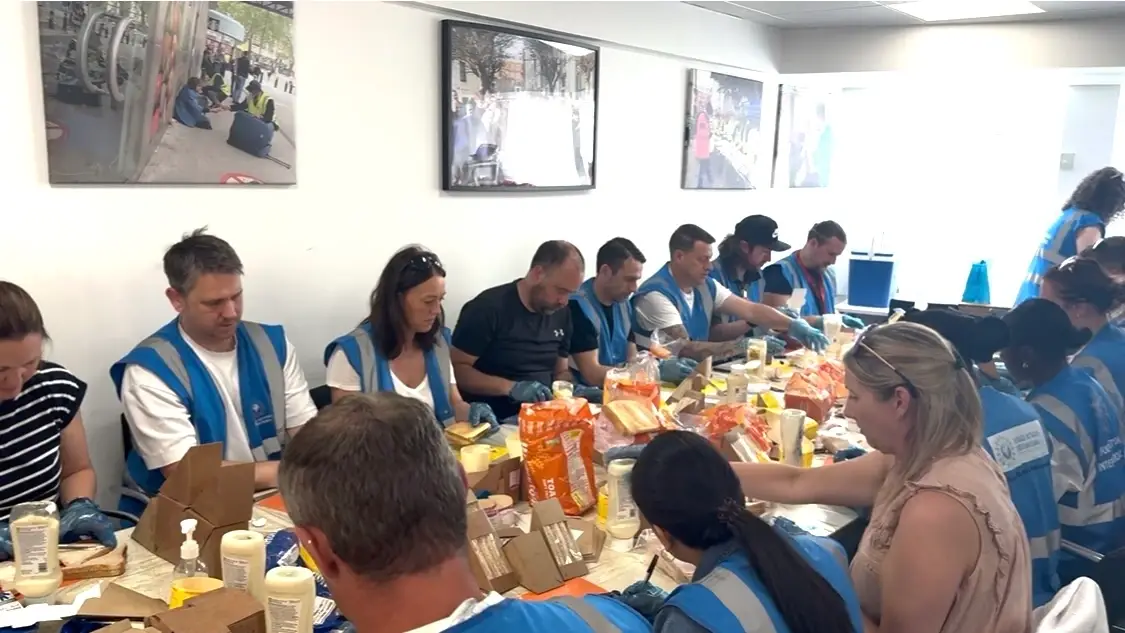 Volunteer to feed homeless and impoverished members of the community