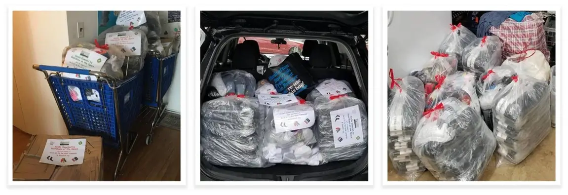Large plastic bags filled with donated socks.