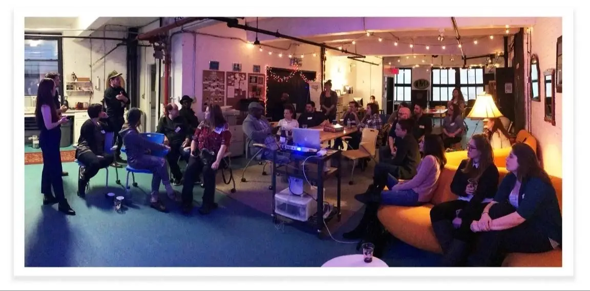A group of people discussing in an office.