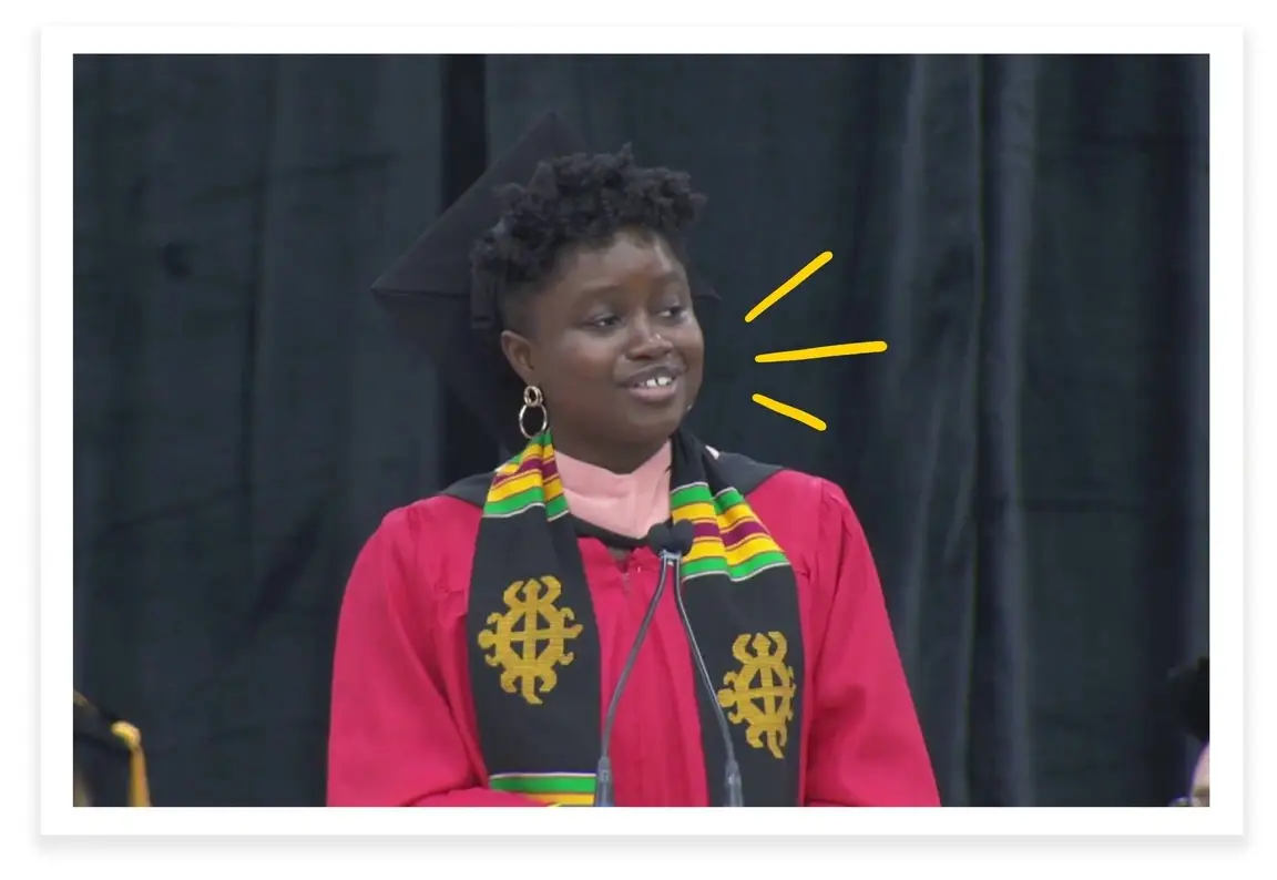 Fatima Dainkeh in a grad cap and robe.