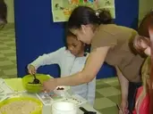 Logo of Girl Scouts of Eastern Iowa and Western Illinois, Inc.