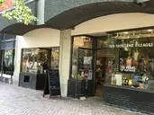 Logo of TEN THOUSAND VILLAGE IOWA CITY