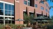Logo of Woodwinds Health Campus - HealthEast