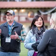 two men and two women talking