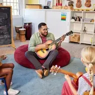 teacher leading music class