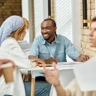 multicultural colleagues try to network at work