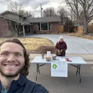 Jet P. from Colorado poses with his Idealist Day folding table.