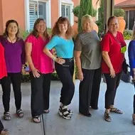 The Idealists of Roseville, CA group smiles for a photo on Idealist Days.
