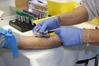 Someone having blood drawn.