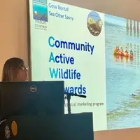 Executive Director Gena Bentall presenting the CAWS program at a conference