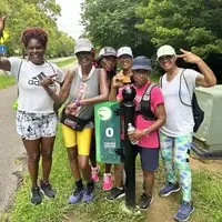 Celebrating a group hike along the Virginia Capital Trail, MM 0 in James City County.