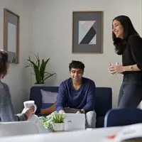 Students chatting in a kitchen in student accommodation