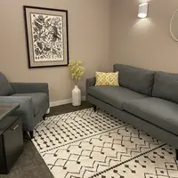 Therapy Office with gray couches.
