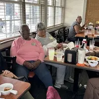 People enjoying a communal meal