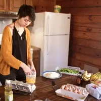 QVS Fellow Making Breakfast on a Retreat