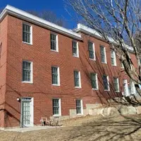 brick multi-family housing building
