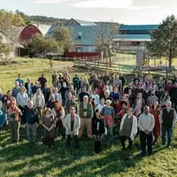 Group shot featuring about half of Hawthorne Valley's current staff taken for 50th anniversary