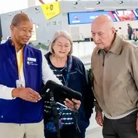 Man giving directions at the Airport