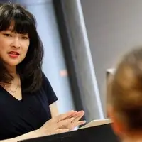 Professor teaching her students