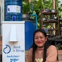 Beneficiary with a biosand filter installed