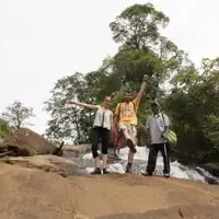 Seraphine a farmer in Kilimanjaro region, with volunteers who visited his farm project, hiking to experience the nature (The highlands of Pare Mountains in Same district, Kilimanjaro region)