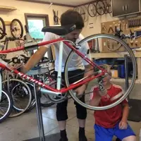 Youth Works on Bike