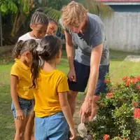 Children and a volunteer at the Honduras Child Alliance PEP classroom.
