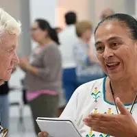Community leaders exchanging peacebuilding strategies