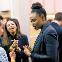 Students networking in London