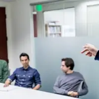 Image of Urban Insight team working in a conference room