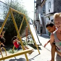 Volunteer playing with Children