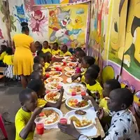 Children eating at smile community centre children's home
