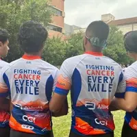 Ride team member jerseys that read Fighting Cancer Every Mile