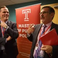 David Thornburgh (CEO of Committee of Seventy) and Dr. Gary Mucciaroni (MPP Program Director) speak to students at a networking event
