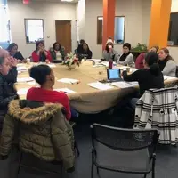 Group of educators around a table