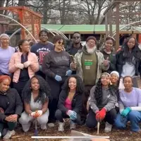 MSK and Howard University students in front of the urban farm after a day of volunteerism.