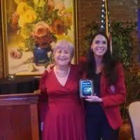 Eva Rajczyk (left) presenter with honoree State Auditor Diana DiZoglio