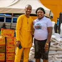 MARYPAT CEO with KING'S oil and rice for 700 widows empowerment Abakaliki Ebonyi Nigeria