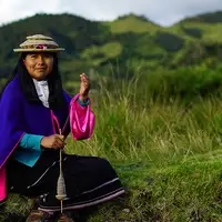 Young Misak woman from Colombia spinning yarn