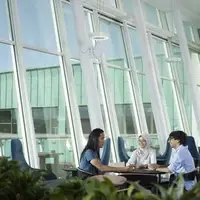 Students in the InfoLab Sky Lounge on campus