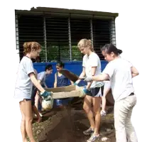 Delegates and community members building foundation