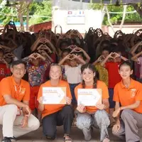 Volunteer are presented a third world certificate after complete placement
