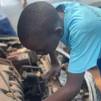 Children learn car mechanics