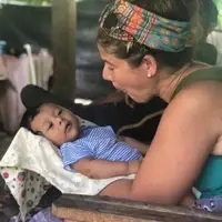 Sam with infant
