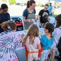 A volunteer helping out at a Pop Up Maker Faire.