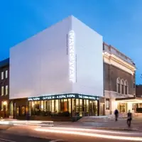 SNF Parkway Theatre exterior lit up at night