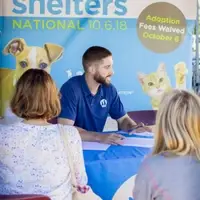 Employee providing adoption counseling to family
