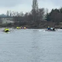 Mill Town Rowing athletes staying safe in hi-viz as they navigate the Snohomish River, training near Langus Riverfront Park in Everett, Washington.