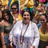 Minister marching with PFLAG NYC in Pride