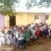 The learning center building and children.